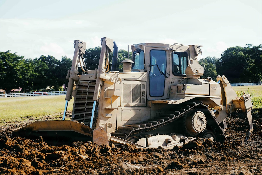 A U.S. Marine with the 22nd Marine Expeditionary Unit (Special Operations Capable), conducts aircraft runway construction on Camp Santiago, Puerto Rico, Dec. 6, 2025. U.S. military forces are deployed to the Caribbean in support of the U.S. Southern Command mission, Department of War-directed operations, and the president’s priorities to disrupt illicit drug trafficking and protect the homeland.(U.S. Marine Corps photo)
