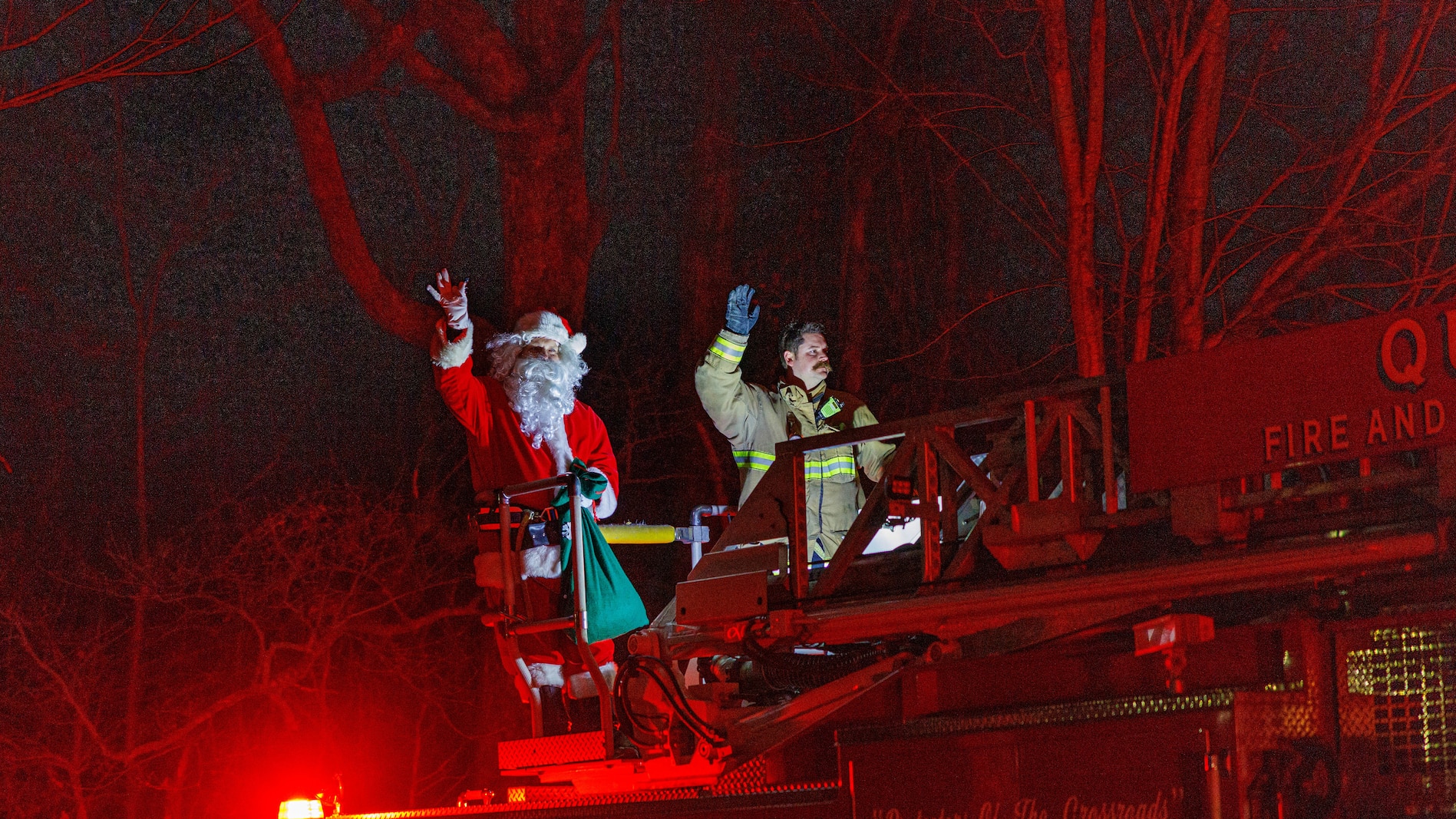 Santa visits families during the 5th Annual Santa Run on Marine Corps Quantico, Virginia, Dec. 20, 2025. The Santa run is an event organized by Station 31 Firefighters to bring holiday cheer to residents aboard MCB Quantico. (U.S. Marine Corps photo by Lance Cpl. Donovan E. Melendez)