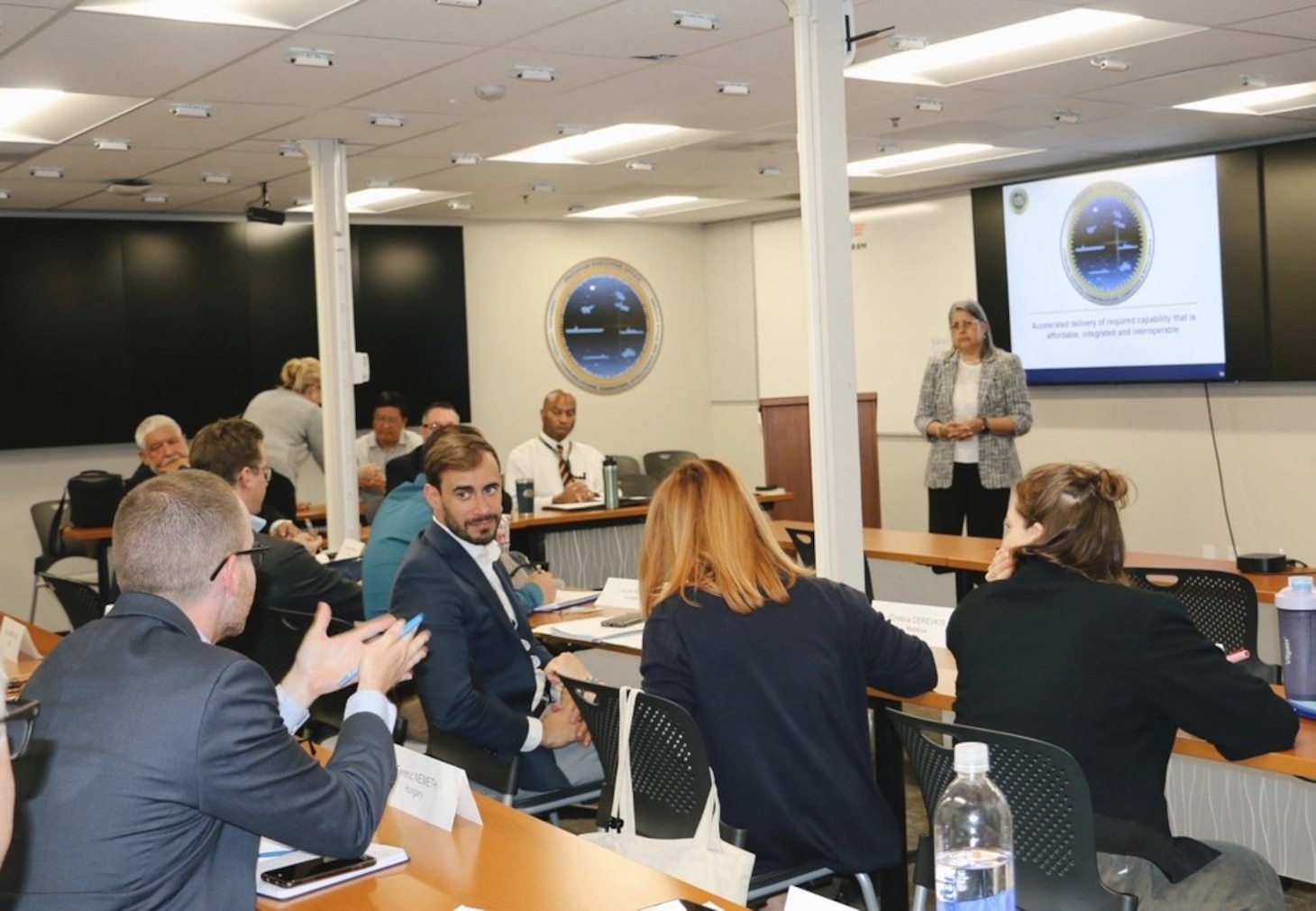 This work, U.S. Navy’s International C4I Integration Program Office (PMW 740) Hosts Global Delegation through International Visitor Leadership Program [Image 3 of 3], by LCDR Janice Leister, identified by DVIDS, must comply with the restrictions shown on https://www.dvidshub.net/about/copyright.