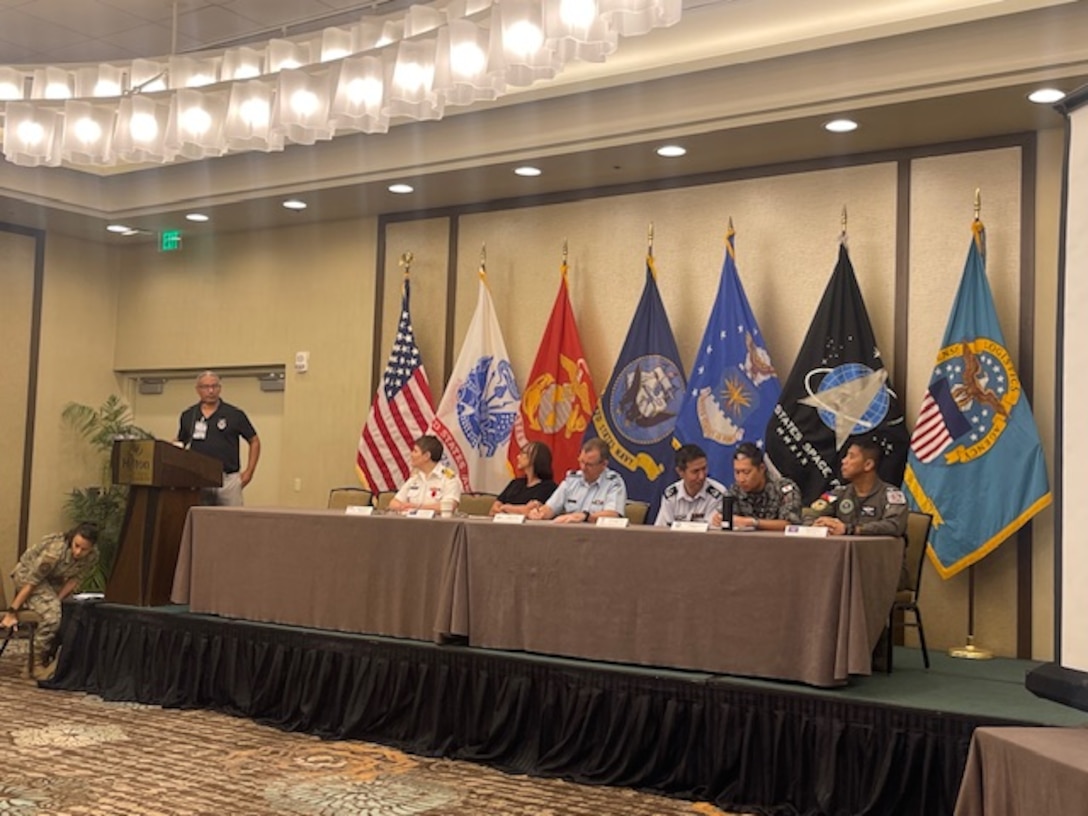 People gather for panel discussion.