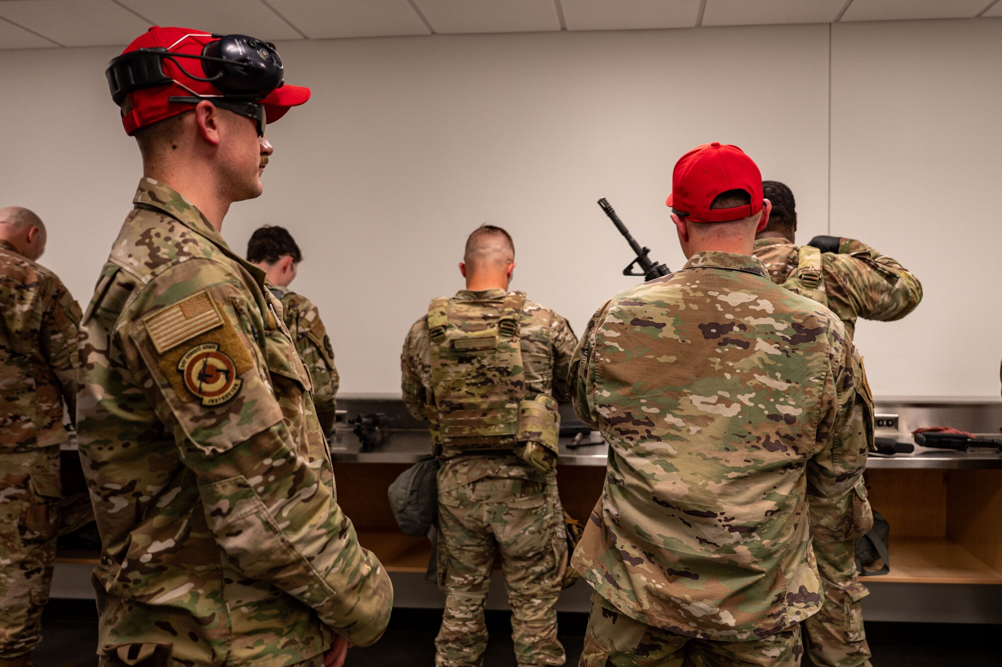 Airmen clean weapons