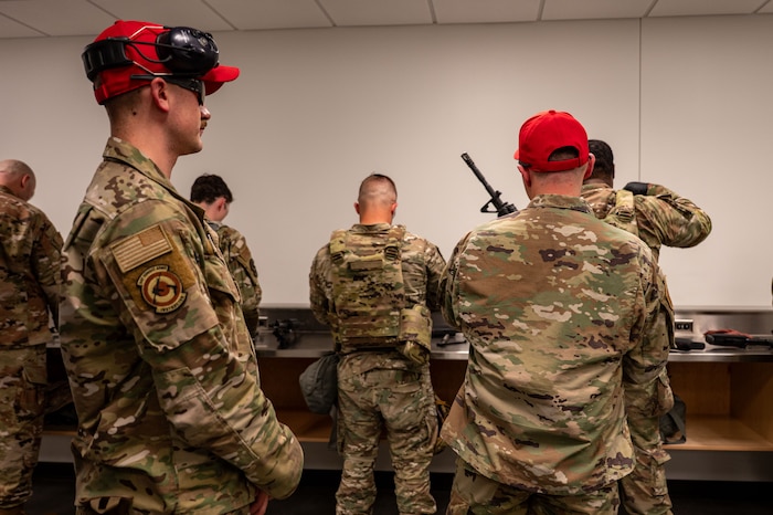 Airmen clean weapons