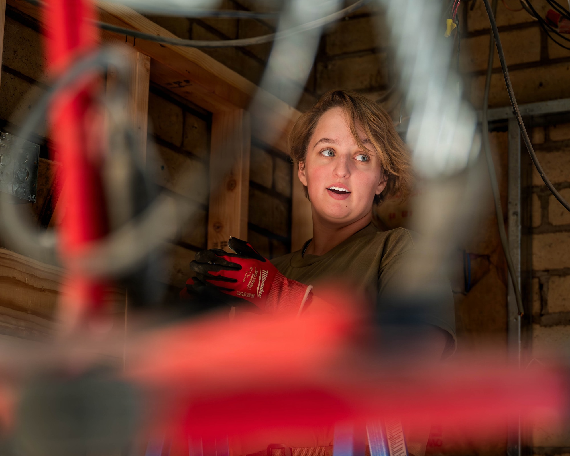 U.S. Air Force Airman 1st Class Mckenzie Campbell, 56th Civil Engineer Squadron electrical technician, helps replace internal framing during renovations of the 56th Fighter Wing’s Fire Station 2, Dec. 5, 2025, at Luke Air Force Base, Arizona.