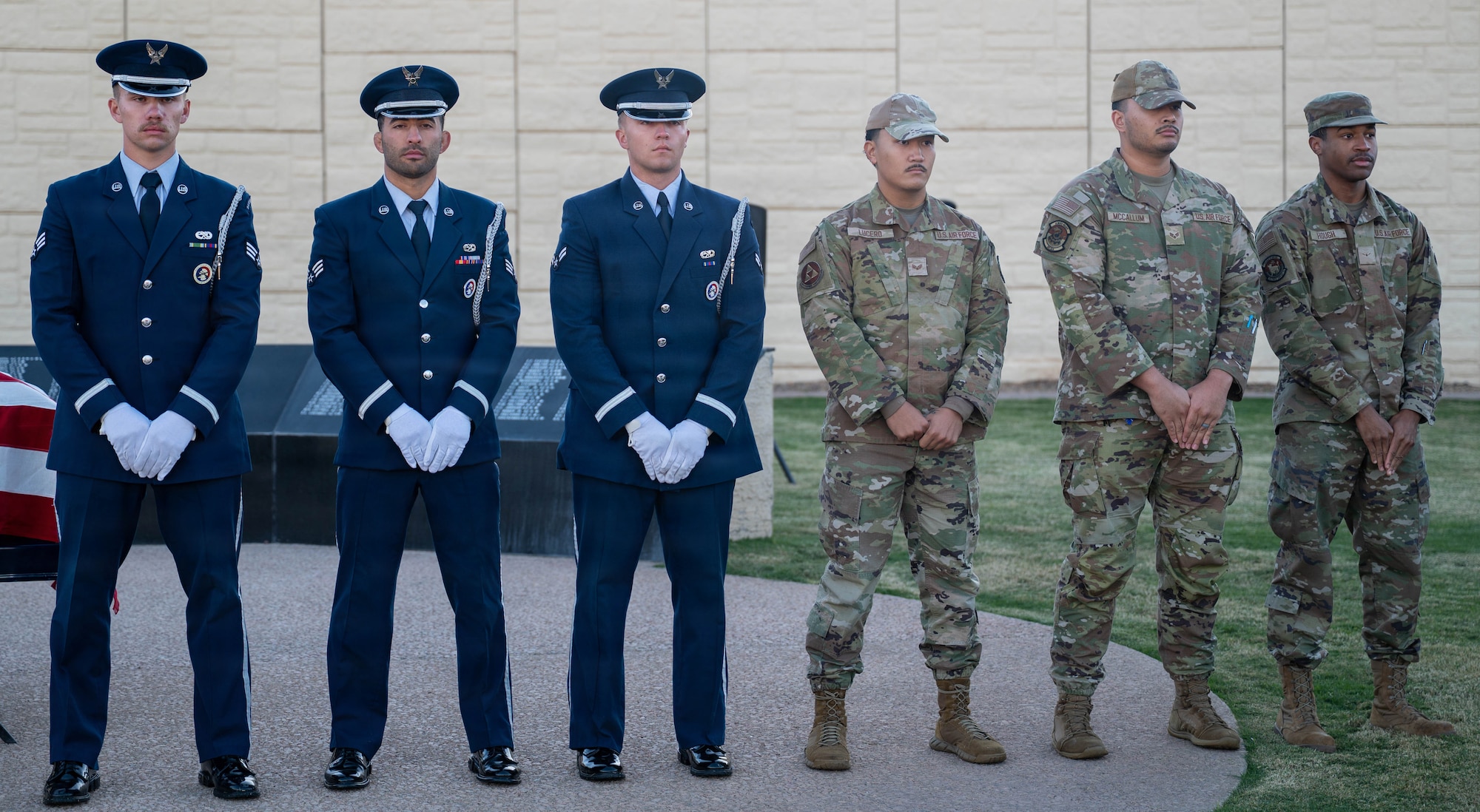 Luke Air Force Base Honor Guard members stand in formation to receive Vice Chief of Staff of the Air Force challenge coins during a ceremony, Dec. 2, 2025, at Luke Air Force Base, Arizona.