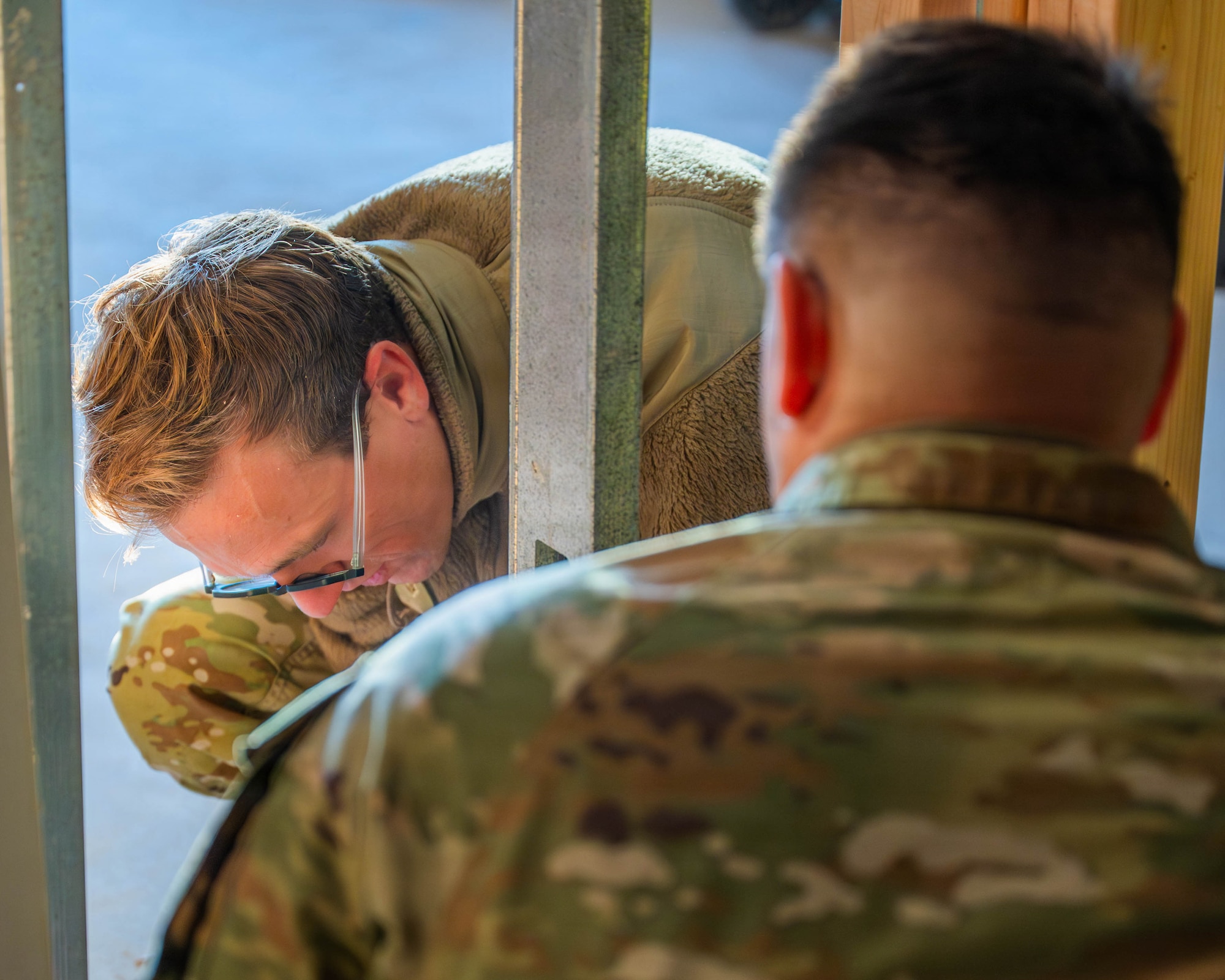 U.S. Air Force Airman 1st Class Jacob Sarradet, 56th Civil Engineer Squadron structural technician, installs structural framing as part of the Fire Station 2 renovation effort, Dec. 5, 2025, at Luke Air Force Base.