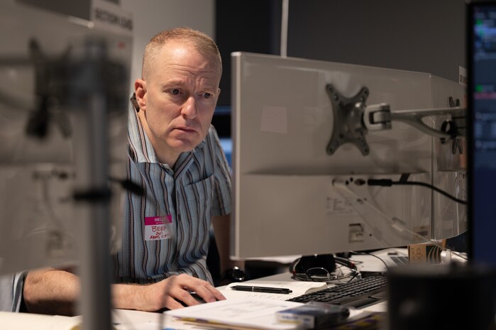 person works at computer