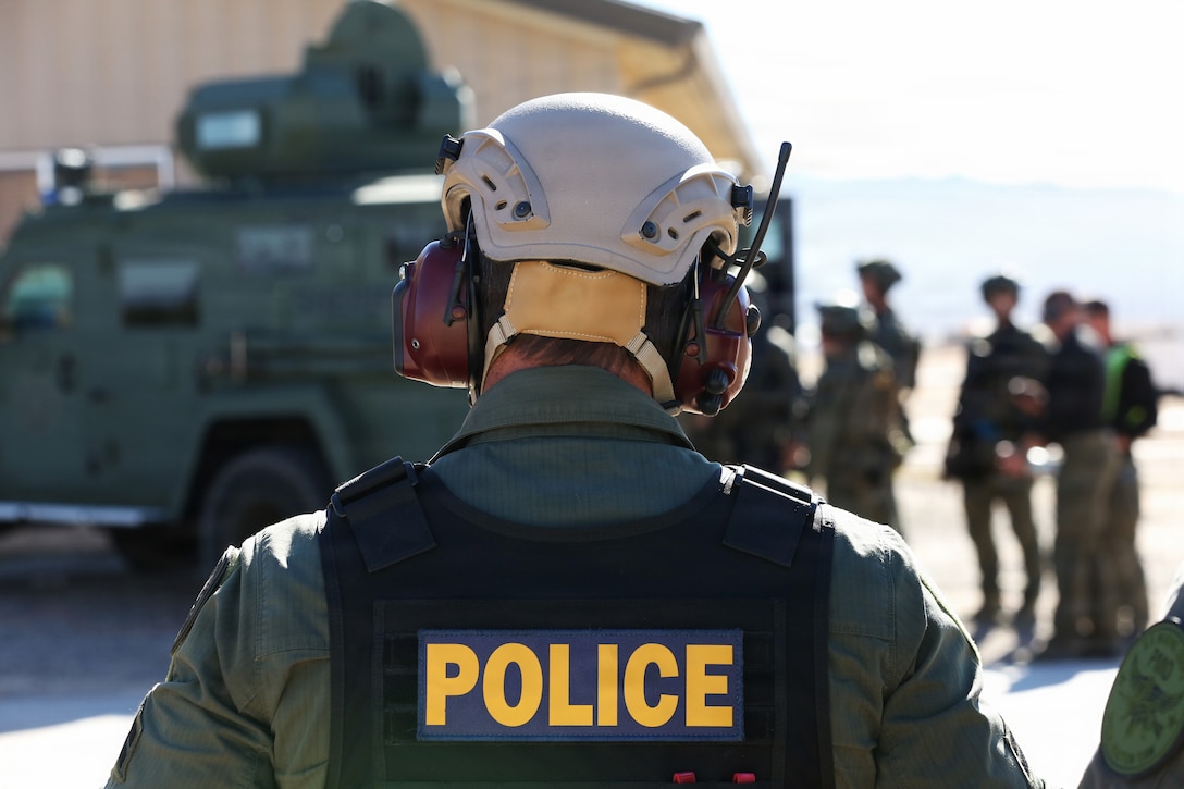 Marines and interagency partners engaged in an Interagency Active Shooter and Mass Casualty Exercise on the Yermo Annex aboard Marine Corps Logistics Base Barstow, 10 December 2025.
“This full-scale regional command training and interoperability exercise is designed to enhance emergency preparedness and rapid response capabilities to violent incidents,” said Maj Grant Burnett, director of Operations. “The exercise involved coordination with key interagency partners, including local law enforcement, local fire and emergency services, as well as federal law agencies.”
Personnel and other resources from the San Bernardino County Sheriffs Office, Naval Criminal Investigation Services, Barstow Fire, California Highway Patrol, Federal Bureau of Investigation, and Mercy Air worked closely with the Provost Marshal’s law enforcement officers, Fire and Emergency Services’ firefighters and paramedics, Dispatch teams, and Base Operations to conduct simulations in-order-to test installation’s emergency response protocols for active shooters and mass casualty incidents.
This complex and multi-faceted training brings together our local agencies and improves communications, working relations, and team building.
Photo by Leo Ritualo.