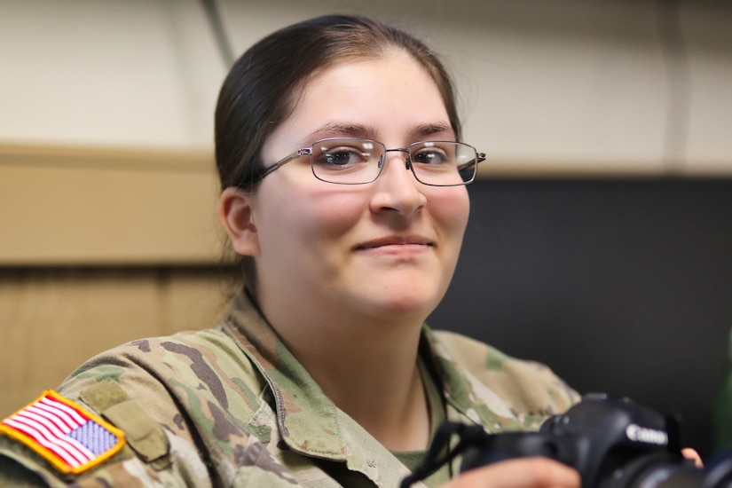 U.S. Army Spc. Skylin Simpson, a public affairs specialist assigned to the 109th Mobile Public Affairs Detachment, 213th Regional Support Group, Pennsylvania Army National Guard, listens during a land navigation class at Fort Indiantown Gap, Pennsylvania, July 15, 2025. 109th MPAD Soldiers were instructed on map reading fundamentals, terrain association and compass use during annual training. (U.S. Army National Guard photo by Sgt. Du-Marc Mills)