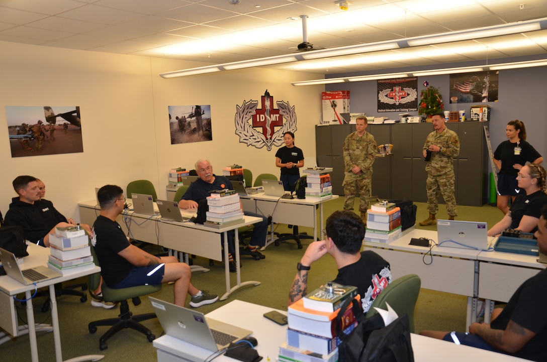Retired Senior Master Sgt. Michael Currey, a former Air Force Independent Duty Medical Technician, spent the afternoon answering questions and sharing stories about his experiences from decades ago with IDMT course instructors and students November 20 at the Medical Education and Training Campus on Joint Base San Antonio-Fort Sam Houston, Texas.