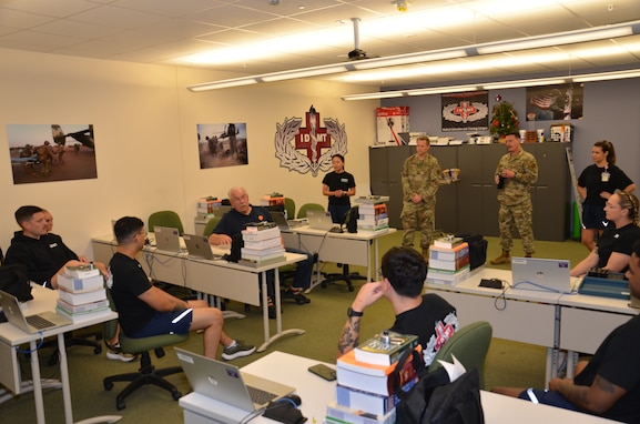 Retired Senior Master Sgt. Michael Currey, a former Air Force Independent Duty Medical Technician, spent the afternoon answering questions and sharing stories about his experiences from decades ago with IDMT course instructors and students November 20 at the Medical Education and Training Campus on Joint Base San Antonio-Fort Sam Houston, Texas.