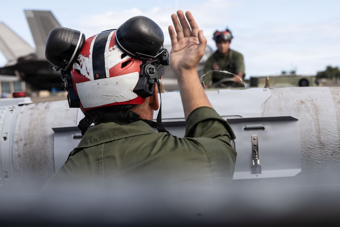 U.S. Marine Corps ordnance technicians with Marine Fighter Attack Squadron (VMFA) 225, U.S. Marine Corps Forces, South, utilize a Short Airfield for Tactical Support weapons loader to move a Laser Joint Directed Attack Munition off a trailer at Jose Aponte de la Torre Airport in Ceiba, Puerto Rico, Dec. 22, 2025. U.S. military forces are deployed to the Caribbean in support of the U.S. Southern Command mission, Department of War-directed operations, and the president’s priorities to disrupt illicit drug trafficking and protect the homeland. (U.S. Marine Corps photo)