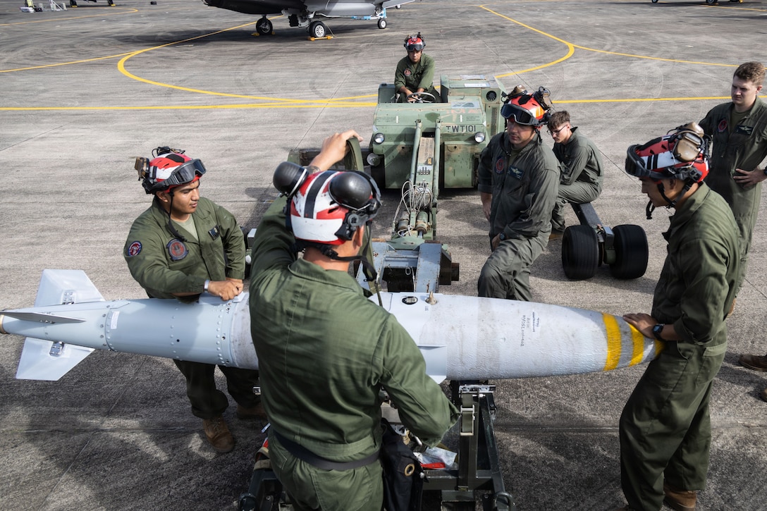 U.S. Marine Corps ordnance technicians with Marine Fighter Attack Squadron (VMFA) 225, U.S. Marine Corps Forces, South, load a Laser Joint Directed Attack Munition onto a Short Airfield for Tactical Support weapons loader at Jose Aponte de la Torre Airport in Ceiba, Puerto Rico, Dec. 22, 2025. U.S. military forces are deployed to the Caribbean in support of the U.S. Southern Command mission, Department of War-directed operations, and the president’s priorities to disrupt illicit drug trafficking and protect the homeland. (U.S. Marine Corps photo)