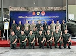 Washington Guard members and Royal Thai Army members pose for a group photo during the Stryker Maintainer and Maintenance Manager Subject Matter Expert Exchange in Chon Buri Province, Thailand, Dec. 1–19, 2025. Courtesy Photo.