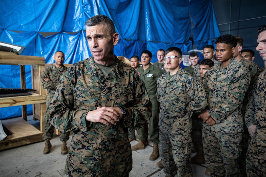 U.S. Marine Corps Sgt. Maj. Anthony J. Loftus, command senior enlisted leader, II Marine Expeditionary Force, speaks to U.S. Marines with Marine Fighter Attack Squadron (VMFA) 225, U.S. Marine Corps Forces, South, at Jose Aponte de la Torre Airport in Ceiba, Puerto Rico, Dec. 12, 2025. U.S. military forces are deployed to the Caribbean in support of the U.S. Southern Command mission, Department of War-directed operations, and the president’s priorities to disrupt illicit drug trafficking and protect the homeland. (U.S. Marine Corps photo)
