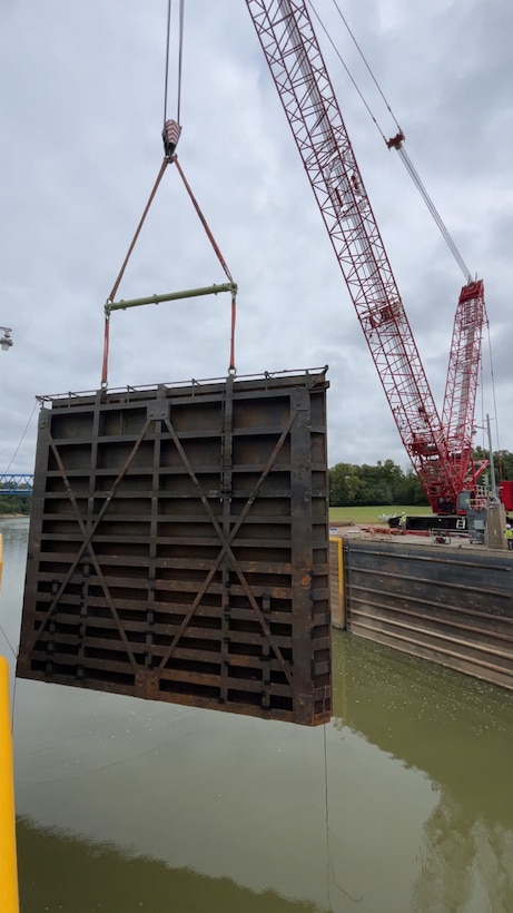 The miter gate at Green Lock and Dam 1 in Reed, Kentucky, is lifted out of the water for the Louisville District team to inspect as part of the miter gate repairs project.