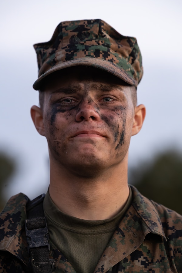 U.S. Marine Corps Pvt. Richard Andras, a Marine with Mike Company, 3rd Recruit Training Battalion, receives his Eagle, Globe and Anchor (EGA) on Marine Corps Recruit Depot Parris Island, S.C., Dec. 23, 2025. Recruits receive their EGA after completing the crucible, a 54-culminating event where they are tested on what they’ve learned over the past 57 training days. (U.S. Marine Corps photo by Cpl. Jordy Morales)