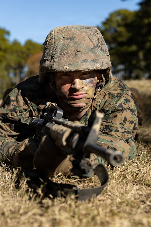 Rct. Dometri Sterling, a recruit with Mike Company, 3rd Recruit Training Battalion, sets security during the Crucible on Marine Corps Recruit Depot Parris Island, S.C., Dec. 22, 2025. The Crucible is the culmination of the knowledge and skills recruits learn throughout recruit training. (U.S. Marine Corps photo by Cpl. Jordy Morales)