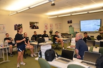 IDMT Alum Reminisces with Staff, Students