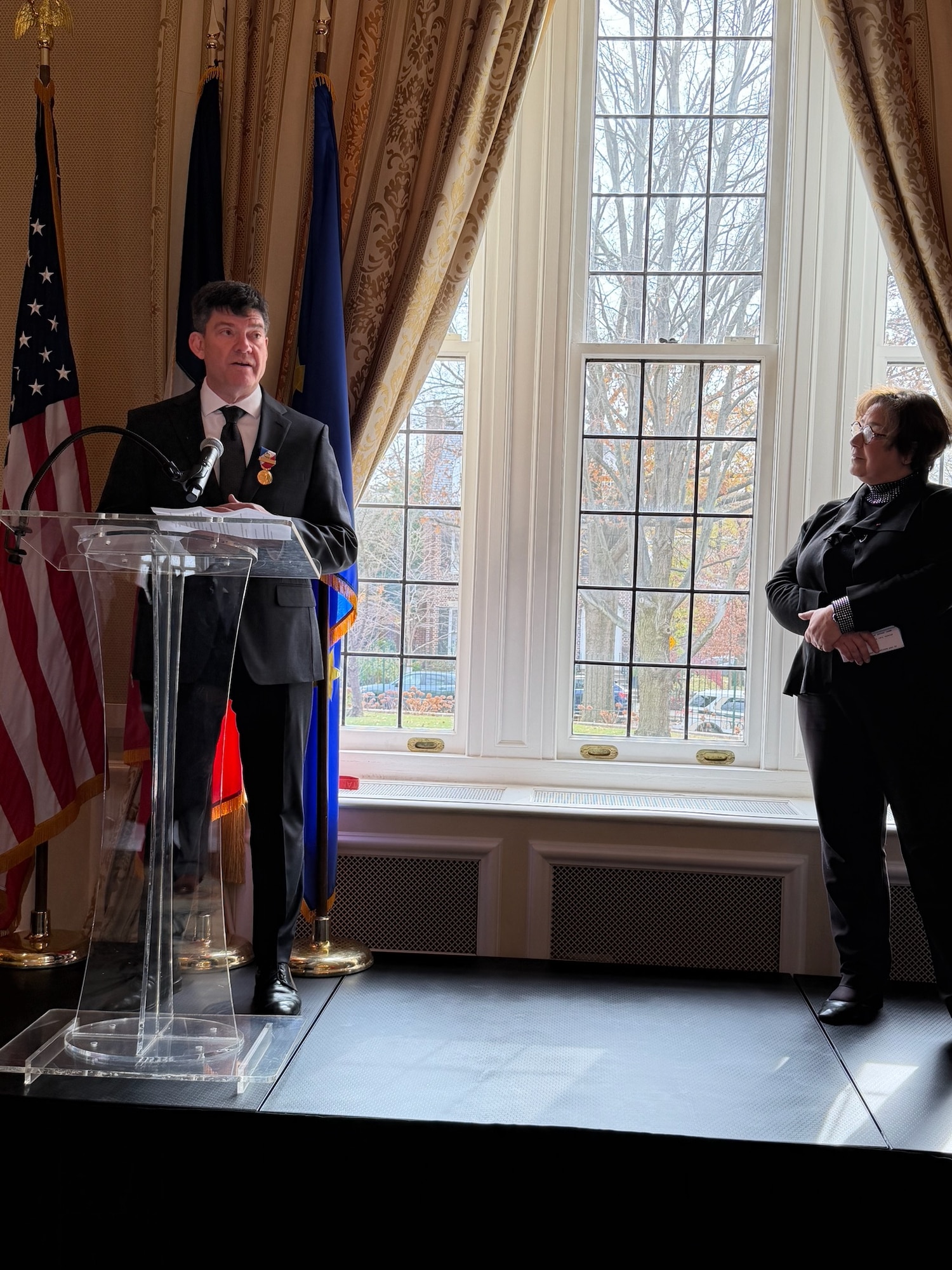 Dr. Jude Sunderbruch, a former top civilian leader of the Air Force Office of Special Investigations, received France’s Medal for Internal Security (Gold Level), from Minister-Counselor Agnès von der Mühll, Dec. 8, 2025.