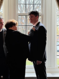 Dr. Jude Sunderbruch, a former top civilian leader of the Air Force Office of Special Investigations, received France’s Medal for Internal Security (Gold Level), from Minister-Counselor Agnès von der Mühll, Dec. 8, 2025.