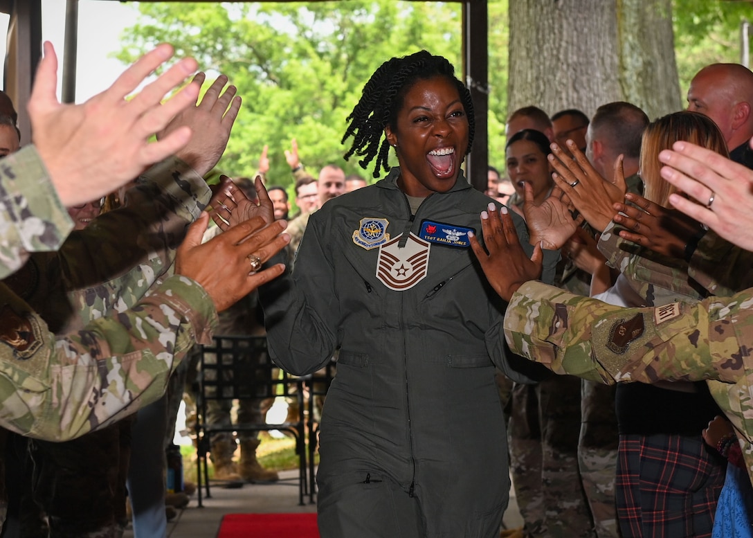 U.S. Air Force Tech. Sgt. Bahja J. Jones, 89th Airlift Wing executive flight attendant, celebrates after learning of her selection for promotion to master sergeant at the release party at The Club at Joint Base Andrews, Maryland, June 6, 2024. Jones, now a second lieutenant and a 316th Security Forces Squadron flight commander, graduated from Officer Training School on Sept. 27, 2024, and her promotion to master sergeant stripes would have been effective Oct. 1, 2024.