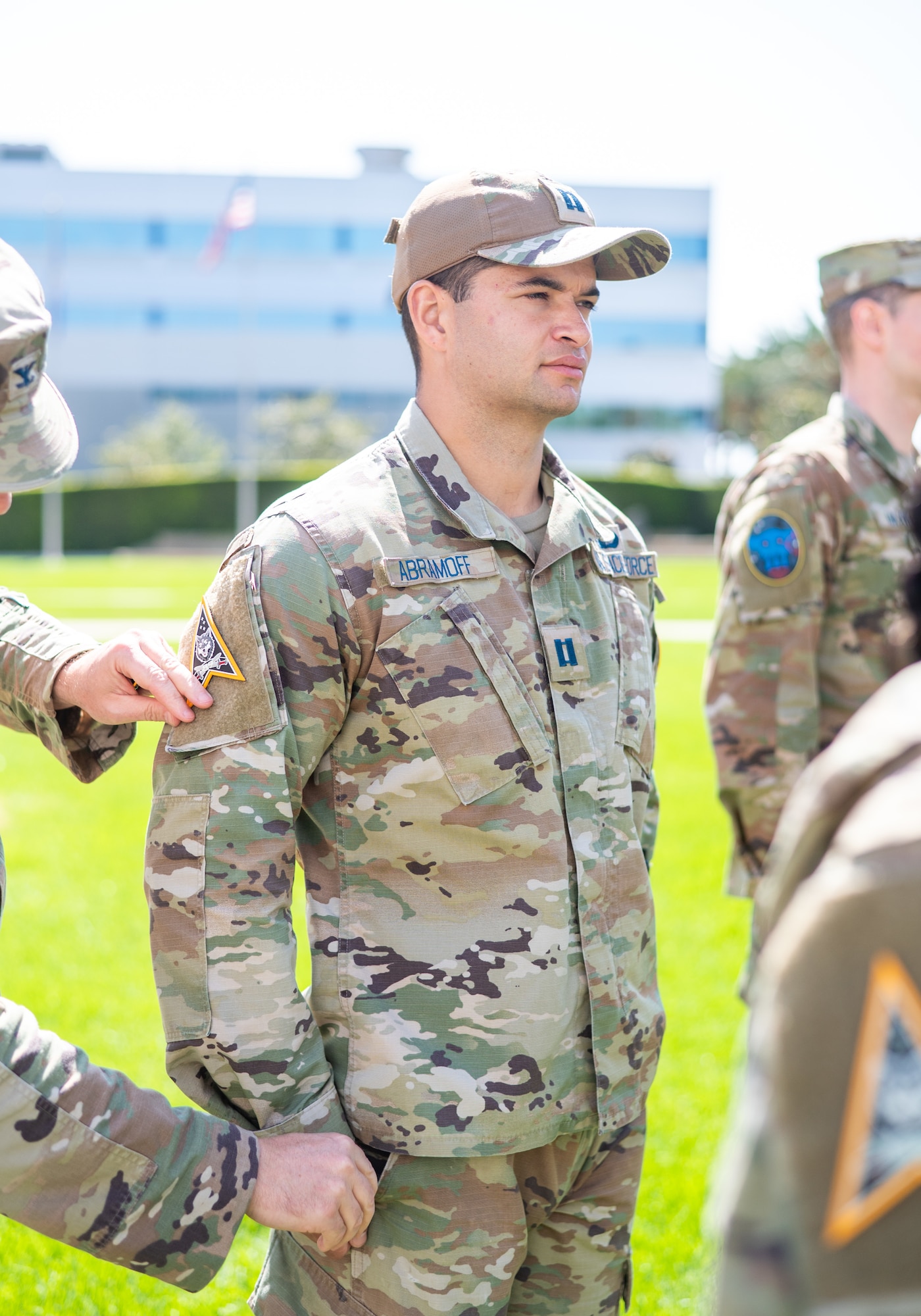USSF Col. Brendan Hochstein, commander of Space Systems Command’s (SSC) System Delta (SYD 89), conducts a patching ceremony at Los Angeles Air Force Base on September 30, 2025. USSF Capt. Nathan Abramoff stands at attention while receiving his SYD 89 patch from the SYD 89 commander. SYD 89 develops and delivers cyber, ground- and space-based combat power capabilities to contest and control the space domain through fires, movement, and maneuver, preserving U.S., Allied, and commercial freedom of action in, from, and to space. SYD 89 supports the Space Combat Power (SCP) Program Executive Office (PEO). (U.S. Space Force photo by Van Ha)