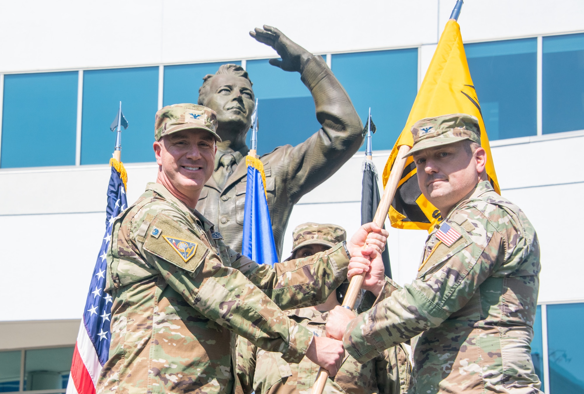 USSF Col. Andrew Menschner, Space Systems Command deputy commander, presides over the assumption of command ceremony at which USSF Col. Brendan Hochstein assumes command of SSC System Delta (SYD 89) at Los Angeles Air Force Base on September 30, 2025. SYD 89 develops and delivers cyber, ground- and space-based combat power capabilities to contest and control the space domain through fires, movement, and maneuver, preserving U.S., Allied, and commercial freedom of action in, from, and to space. SYD 89 supports the Space Combat Power (SCP) Program Executive Office (PEO). (U.S. Space Force photo by Van Ha)