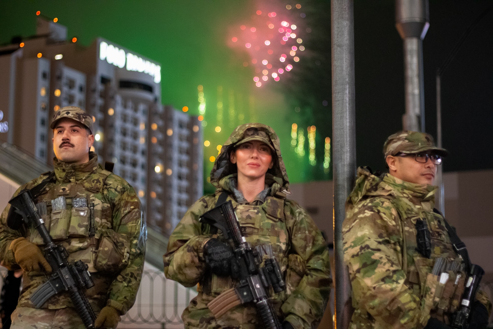 U.S. Army Spc. Ulises Enriquez (left), Sgt. Andrea Flenner (center), Spc. Xarn Manzon (right) conducts security operations on the Las Vegas 'Strip' in Las Vegas, Nevada, Jan. 1, 2026.  For more than 25 years, the Nevada National Guard has supported New Year's Eve public safety operations, with roughly 190 Soldiers activated for this year's event. (U.S. Army National Guard photo by 1st Lt. Byronjames Crisostomo)
