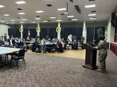 U.S. Air Force Brig. Gen. Gwendolyn A Foster, 59th Medical Wing Commander, addresses attendees during a science and technology symposium hosted by the 59th Medical Wing at Joint Base San Antonio–Lackland, Texas, on Jan. 6, 2026.