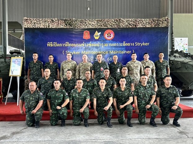 Washington Guard members and Royal Thai Army members pose for a group photo during the Stryker Maintainer and Maintenance Manager Subject Matter Expert Exchange in Chon Buri Province, Thailand, Dec. 1–19, 2025.