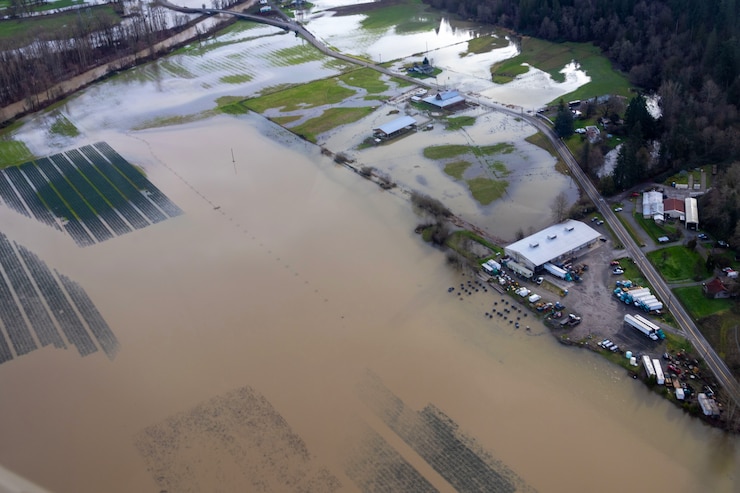 Photo of submerged roads and damaged infrastructures due to floods in Northwestern Washington.