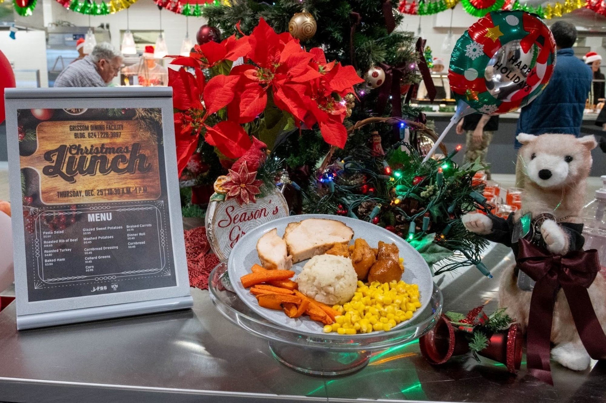 Christmas decorations are displayed around a lunch plate inside the Grissom Dining Facility at Misawa Air Base, Japan, Dec. 25, 2025.