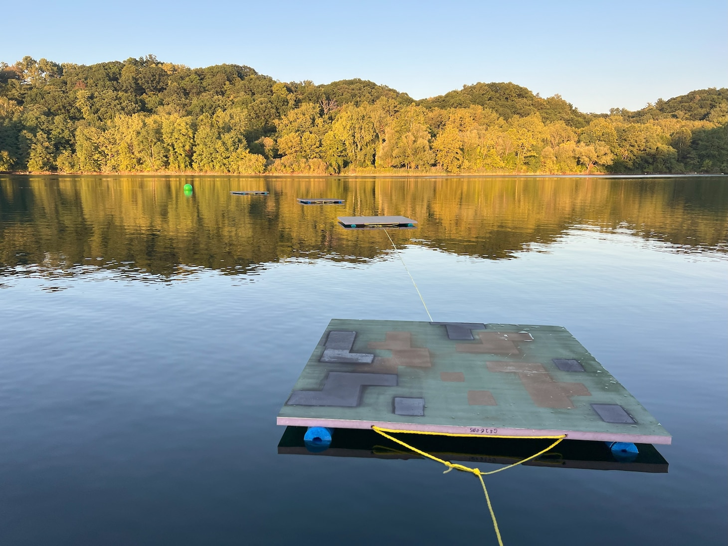 The U.S. Naval Research Laboratory (NRL) launched a groundbreaking remote sensing experiment, Coastal Hyperspectral Reflectance Object Material Analysis (CHROMA), Sept. 4-19, 2025, designed to accelerate the application of artificial intelligence (AI) in hyperspectral imaging and strengthen environmental intelligence and resource management capabilities across the Department of War and the wider scientific community. Camouflage-coated panels float on the water to simulate the appearances of ships and other objects of interest to the Navy. Data from these targets is crucial for developing technology to improve naval asset survivability. (U.S. Navy photo)