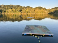 The U.S. Naval Research Laboratory (NRL) launched a groundbreaking remote sensing experiment, Coastal Hyperspectral Reflectance Object Material Analysis (CHROMA), Sept. 4-19, 2025, designed to accelerate the application of artificial intelligence (AI) in hyperspectral imaging and strengthen environmental intelligence and resource management capabilities across the Department of War and the wider scientific community. Camouflage-coated panels float on the water to simulate the appearances of ships and other objects of interest to the Navy. Data from these targets is crucial for developing technology to improve naval asset survivability. (U.S. Navy photo)