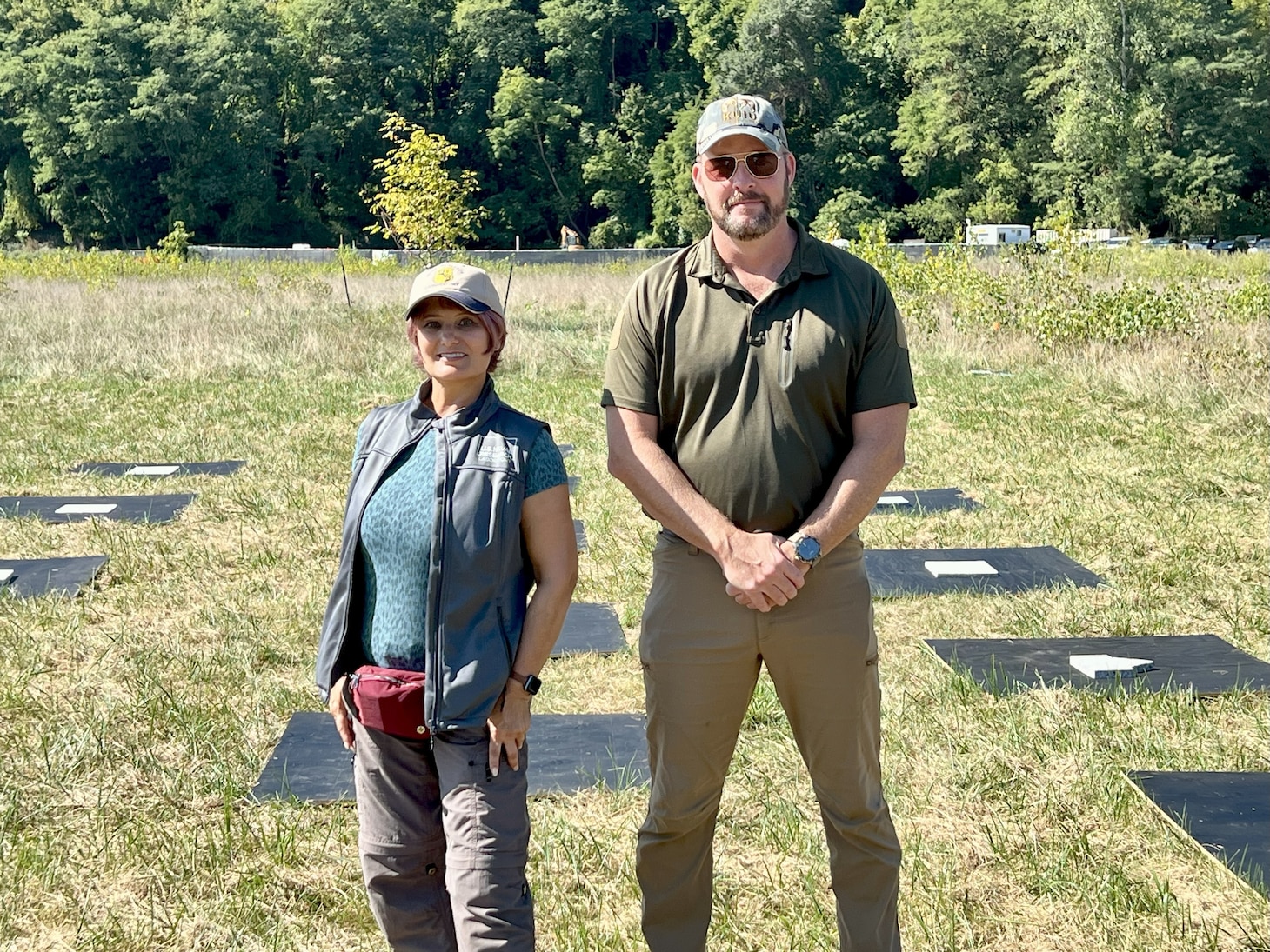 The U.S. Naval Research Laboratory (NRL) launched a groundbreaking remote sensing experiment, Coastal Hyperspectral Reflectance Object Material Analysis (CHROMA), Sept. 4-19, 2025, designed to accelerate the application of artificial intelligence (AI) in hyperspectral imaging and strengthen environmental intelligence and resource management capabilities across the Department of War and the wider scientific community. NRL’s CHROMA Project Lead Katarina Doctor, Ph.D., and Scott Ramsey, Head of the NRL Signature Technology Office, stand with ground targets used in the experiment. The panels contain specific rock and mineral samples to act as known reference points for the sensors. (U.S. Navy photo)