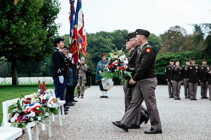 (From right) Lt. Col. Neal Harvey, Brig. Gen. Brad Carter, assistant adjutant general-Army for Oklahoma, and Lt. Col. Caleb Emde prepare to lay a wreath during a ceremony honoring the 45th Infantry Division Soldiers laid to rest at Epinal American Cemetery and Memorial in Epinal, France, Sept. 24, 2025.  The delegation of Oklahoma National Guard members toured key locations from the 45th Infantry Division’s campaign in northeastern France against German forces during World War II. (U.S. Army photo by Staff Sgt. John Stoner)