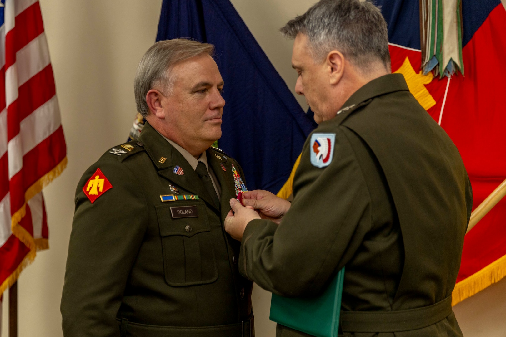 Col. Kevin Roland receives the Legion of Merit from Maj. Gen. Thomas H. Mancino, adjutant general for Oklahoma, during his retirement ceremony at the Oklahoma City Military Complex in Oklahoma City, Oct. 30, 2025. Roland served 34 years in the military, starting in the Marine Corps before joining the Oklahoma Army National Guard, where he served in numerous impactful roles. Though retired from military service, Roland will continue to serve in a civilian role as the State Youth Programs Director, where he will oversee Thunderbird Challenge Program, Sooner Job Challenge and STARBASE Oklahoma. (Oklahoma National Guard Photo by Sgt. Haden Tolbert)
