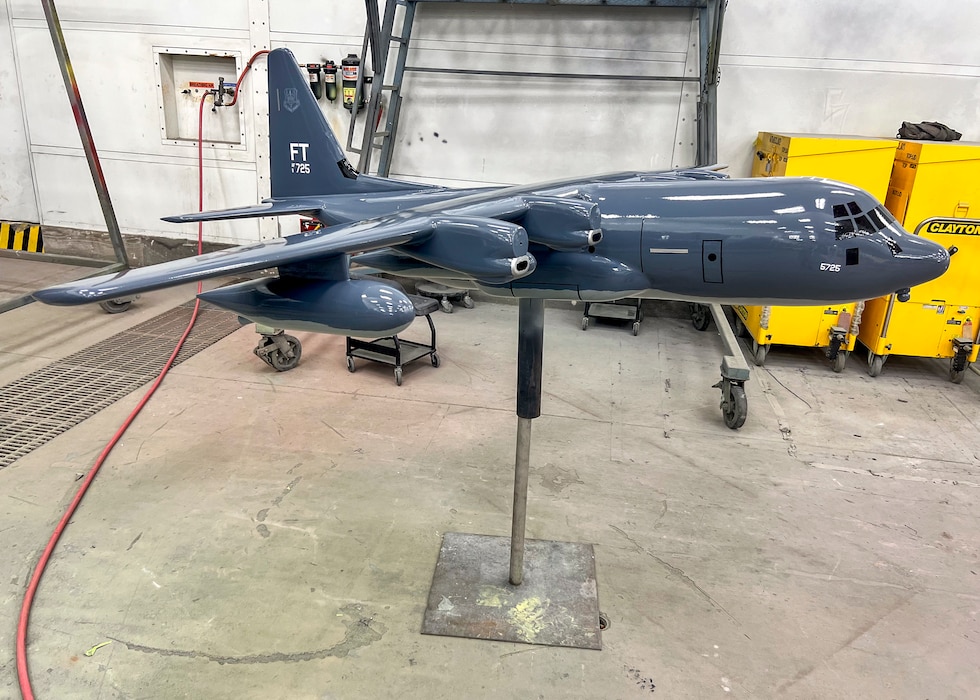 An HC-130J Combat King II model dries after a clearcoat application at Moody Air Force Base, Georgia, Oct. 29, 2025. The clearcoat was applied to protect the model and help preserve Moody’s miniature aircraft displays for future visitors. (U.S. Air Force photo by Tech. Sgt. Christopher Buentello)