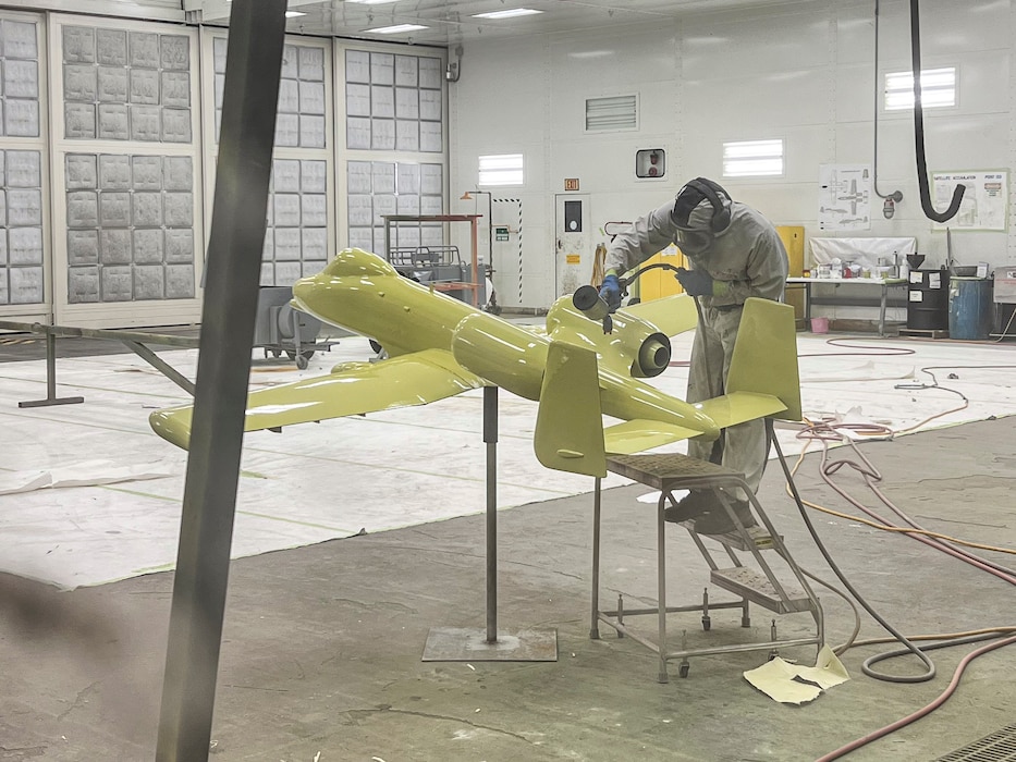 U.S. Air Force Airman 1st Class Zach Langdon, 23d Maintenance Squadron aircraft structural maintenance specialist, applies chromated primer to an A-10C Thunderbolt II model at Moody Air Force Base, Georgia, Aug. 28, 2025. Airmen repaired and repainted the model, restoring it to represent the 23d Wing’s heritage while protecting it from future weather damage. (U.S. Air Force photo by Tech. Sgt. Christopher Buentello)