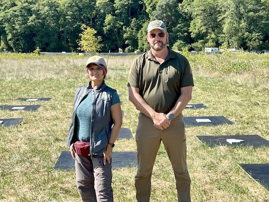 The U.S. Naval Research Laboratory (NRL) launched a groundbreaking remote sensing experiment, Coastal Hyperspectral Reflectance Object Material Analysis (CHROMA), Sept. 4-19, 2025, designed to accelerate the application of artificial intelligence (AI) in hyperspectral imaging and strengthen environmental intelligence and resource management capabilities across the Department of War and the wider scientific community. NRL’s CHROMA Project Lead Katarina Doctor, Ph.D., and Scott Ramsey, Head of the NRL Signature Technology Office, stand with ground targets used in the experiment. The panels contain specific rock and mineral samples to act as known reference points for the sensors. (U.S. Navy photo)