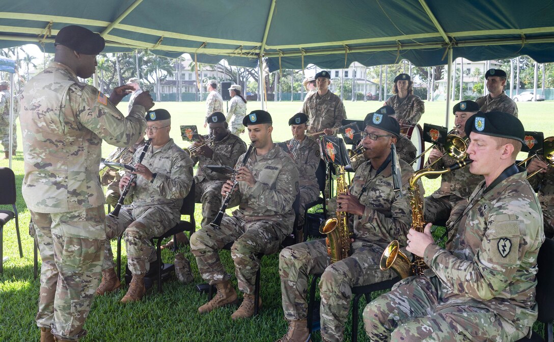 U.S. Army Soldiers assigned to the 25th Infantry Division Band perform during a Flying V ceremony at Historic Palm Circle, Fort Shafter, Hawaii, Jan. 6, 2025.
