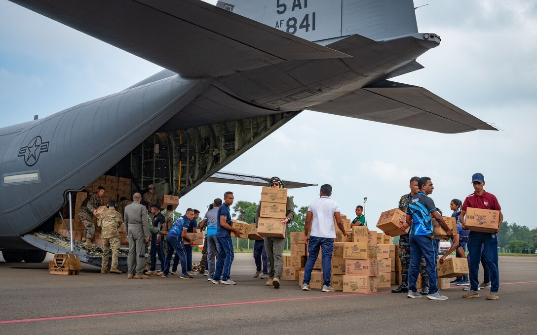 Following Cyclone Ditwah, members of the U.S. Air Force conduct a mission delivering disaster response supplies to flood-affected areas of Sri Lanka.