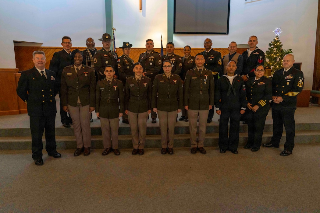 251216-N-JC800-1144 YORKTOWN, Virginia (Dec. 16, 2025) - Class 25010, along with Naval Leader and Professional Development Command leadership and Tri-Service Optician School staff pose for a group photo during the graduation ceremony Dec. 16. (U.S. Navy photo by Mass Communication Specialist 1st Class Heath Zeigler/Released)