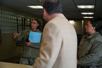 U.S. Air Force Col. Angelique Nelson, left, 11th Mission Support Group commander, leads a discussion with Adam Dontz, center, Deputy Assistant Secretary of War for Housing at Joint Base Anacostia-Bolling, Washington, D.C., Dec. 9, 2025. Dontz conducted meetings with JBAB, 11th Wing, and Military Housing Office leadership and toured unaccompanied service member housing. (U.S. Air force photo by Airman 1st Class Shanel Toussaint)