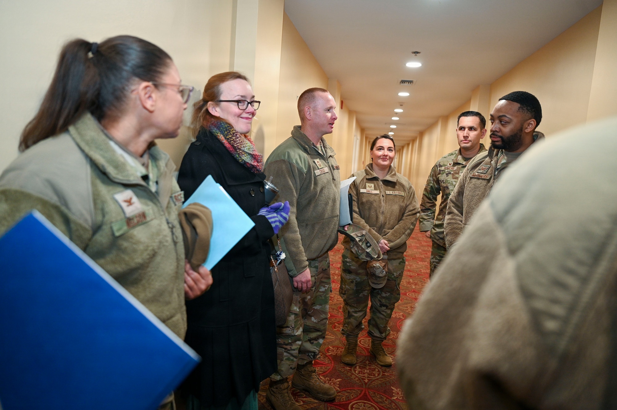 Members of the 11th Wing commander’s action group conduct a tour with Adam Dontz, Deputy Assistant Secretary of War for Housing, at the Furnari Hall Dorm on Joint Base Anacostia-Bolling, Washington, D.C., Dec. 9, 2025. The group met to tour existing housing facilities and discuss housing improvement projects for JBAB. (U.S. Air force photo by Airman 1st Class Shanel Toussaint)