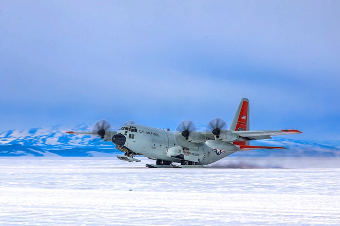 A LC-130 Skibird takes off in Antarctica. The New York National Guard's 109th Airlift Wing flies the LC-130 in support of Operation Deep Freeze.