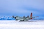 A LC-130 Skibird takes off in Antarctica. The New York National Guard's 109th Airlift Wing flies the LC-130 in support of Operation Deep Freeze.