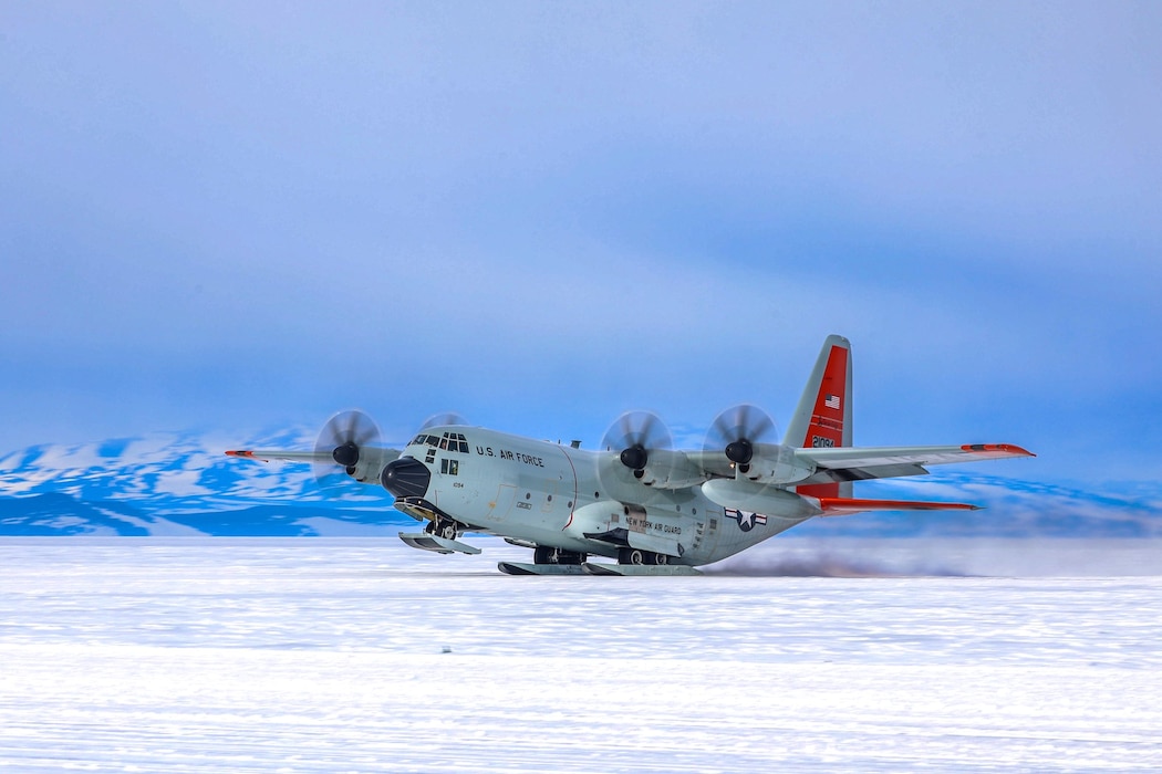 A LC-130 Skibird takes off in Antarctica. The New York National Guard's 109th Airlift Wing flies the LC-130 in support of Operation Deep Freeze.