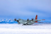 A LC-130 Skibird takes off in Antarctica. The New York National Guard's 109th Airlift Wing flies the LC-130 in support of Operation Deep Freeze.