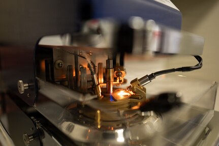 A flash point analyzer ignites fuel vapors during a quality control test at Joint Base San Antonio, Texas, Jan. 6, 2026. The flash point indicates the lowest temperature at which fuel emits vapors that can ignite, ensuring the fuel meets safety standards. (U.S. Air Force photo by Jonathan R. Mallard)